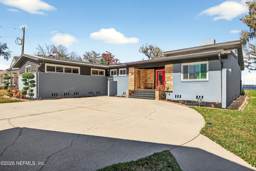Welcome to this stunning 4-bedroom, 3-bathroom riverfront home - Beach Home for sale in Green Cove Springs, Florida on Beachhouse.com