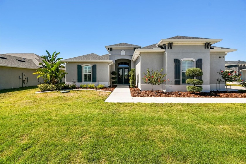 Nestled within the serene and wildlife-rich Lake Toscana - Beach Home for sale in Wimauma, Florida on Beachhouse.com