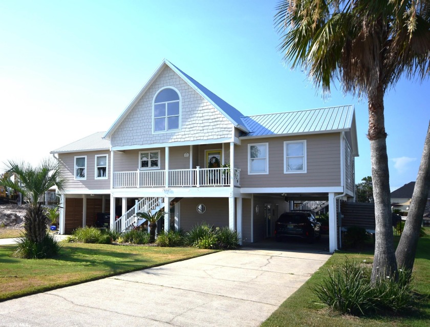 WOW!! LOCATION, LOCATION, LOCATION! THIS GORGEOUS WATERFRONT - Beach Home for sale in Orange Beach, Alabama on Beachhouse.com