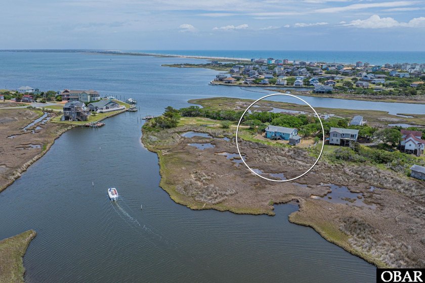 Discover the opportunity to own a cute canalfront cottage in the - Beach Home for sale in Hatteras Island, North Carolina on Beachhouse.com