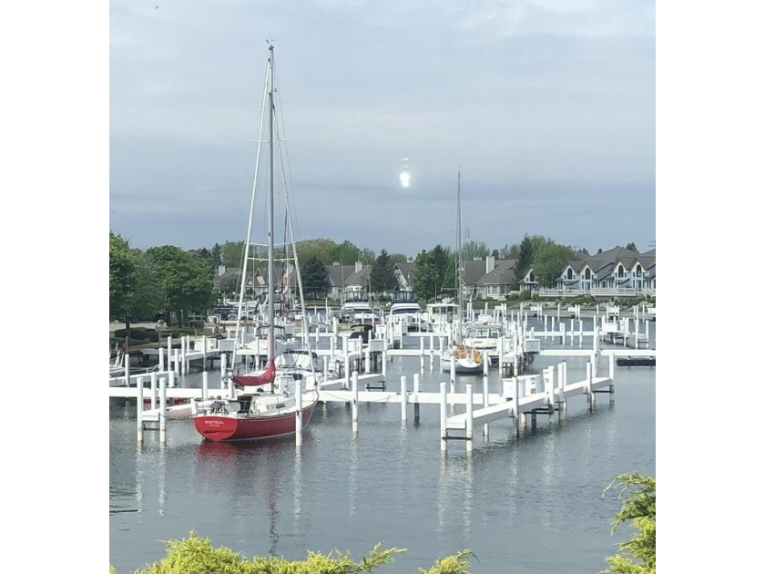 Now available! This 40'' boat slip in Harbor Village Marina in - Beach Lot for sale in Manistee, Michigan on Beachhouse.com