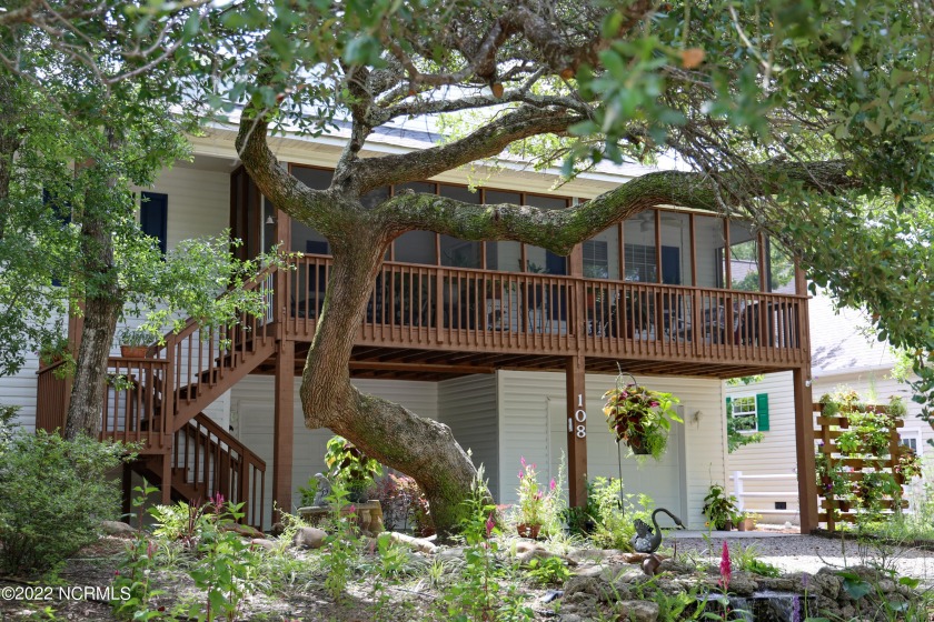 Minutes from the beach and tucked away on a beautifully - Beach Home for sale in Oak Island, North Carolina on Beachhouse.com