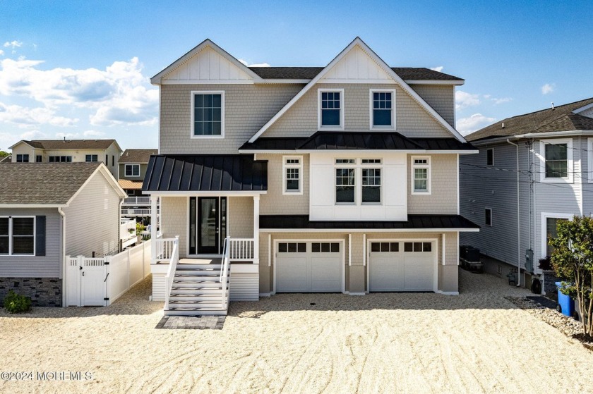 Top-of-the-line luxury WATERFRONT new construction in the highly - Beach Home for sale in Manahawkin, New Jersey on Beachhouse.com