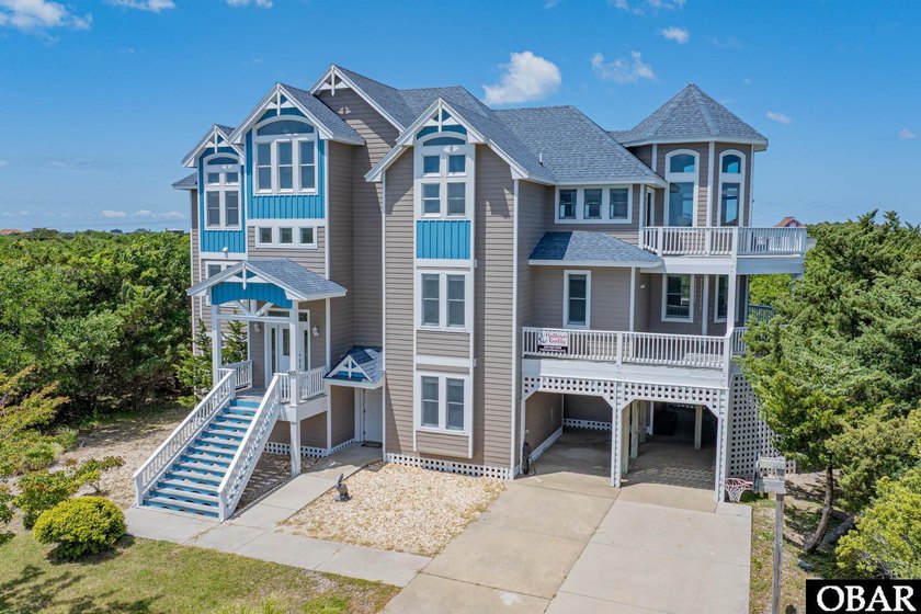 Tucked away on a beautiful lakefront lot in the popular - Beach Home for sale in Avon, North Carolina on Beachhouse.com