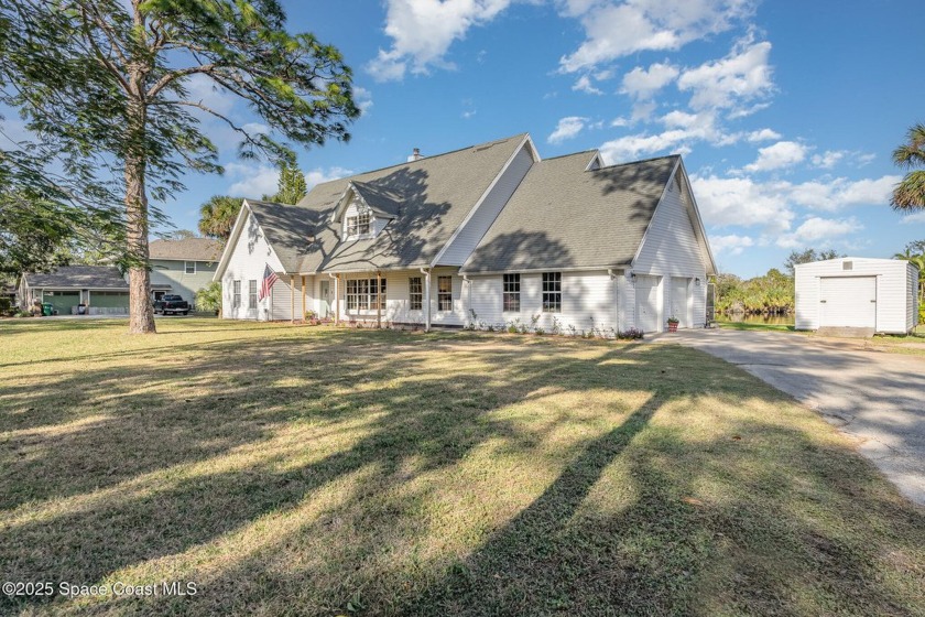 ENJOY peace and quiet in this unique property with 4/3 and half - Beach Home for sale in Titusville, Florida on Beachhouse.com