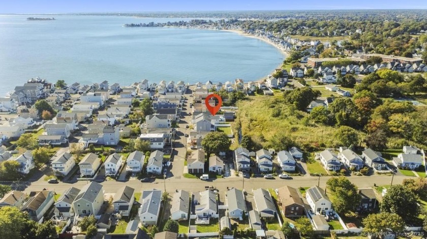 Welcome to this stunning 2-bedroom, 2-bathroom coastal retreat - Beach Home for sale in Milford, Connecticut on Beachhouse.com