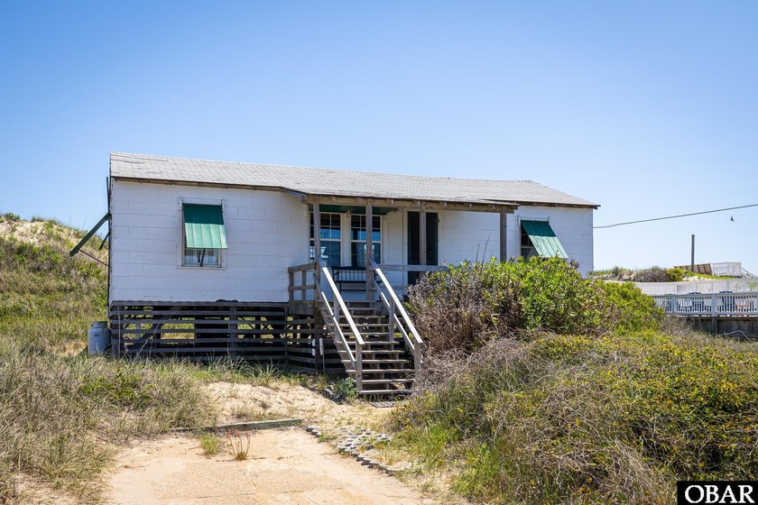Come see this vintage beach cottage that has been the summer get - Beach Home for sale in Nags Head, North Carolina on Beachhouse.com