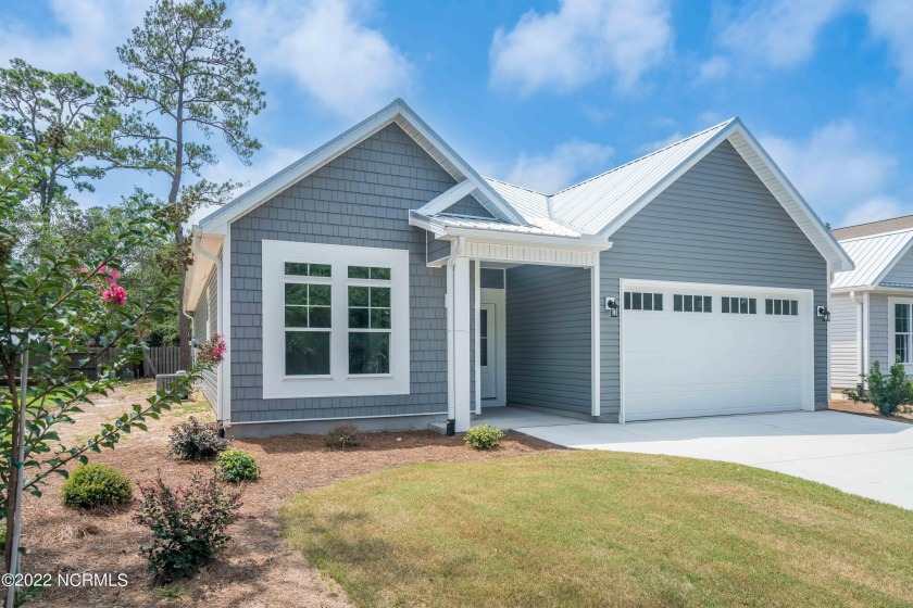 This stunning new construction home is 1489 heated sqft of - Beach Home for sale in Oak Island, North Carolina on Beachhouse.com