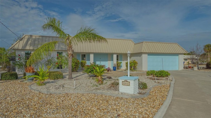 Experience exceptional island living at 5576 Contento Drive - Beach Home for sale in Sarasota, Florida on Beachhouse.com