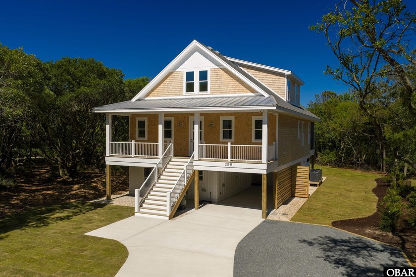 High Quality New Construction! Nestled in the highly - Beach Home for sale in Southern Shores, North Carolina on Beachhouse.com