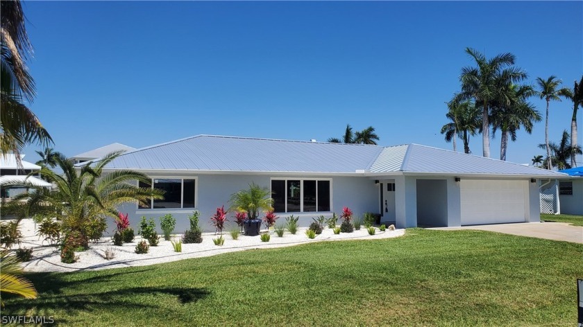 MAKE THIS INCREDIBLE, COMTEMPORARY ISLAND REMODEL YOUR NEXT - Beach Home for sale in ST. James City, Florida on Beachhouse.com