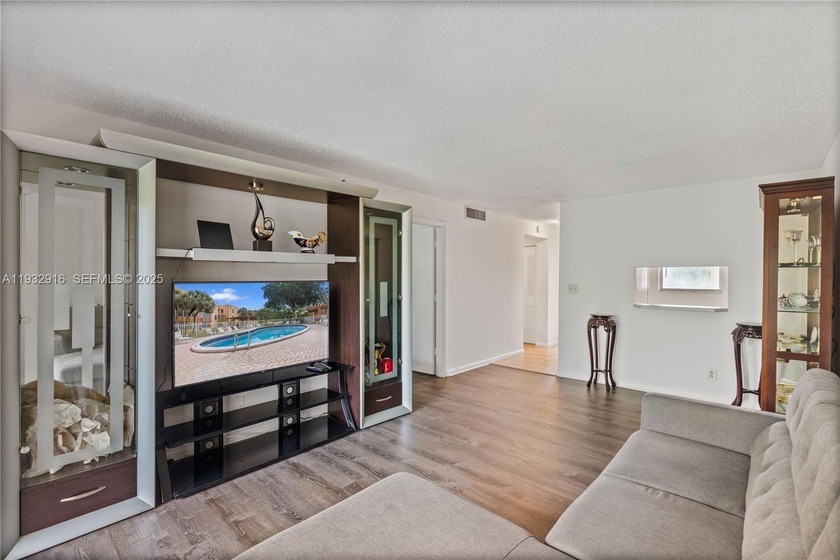 Welcome to easy living in this charming 1-bed, 1-bath corner - Beach Condo for sale in Tamarac, Florida on Beachhouse.com