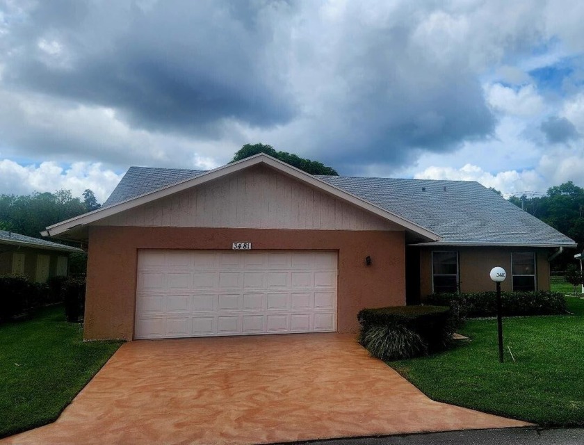 This home in a gated Golf Course community with no mandatory - Beach Home for sale in West Palm Beach, Florida on Beachhouse.com