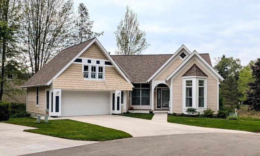 Located in the highly desirable Cottages of Bay Meadows this 3 - Beach Condo for sale in Holland, Michigan on Beachhouse.com