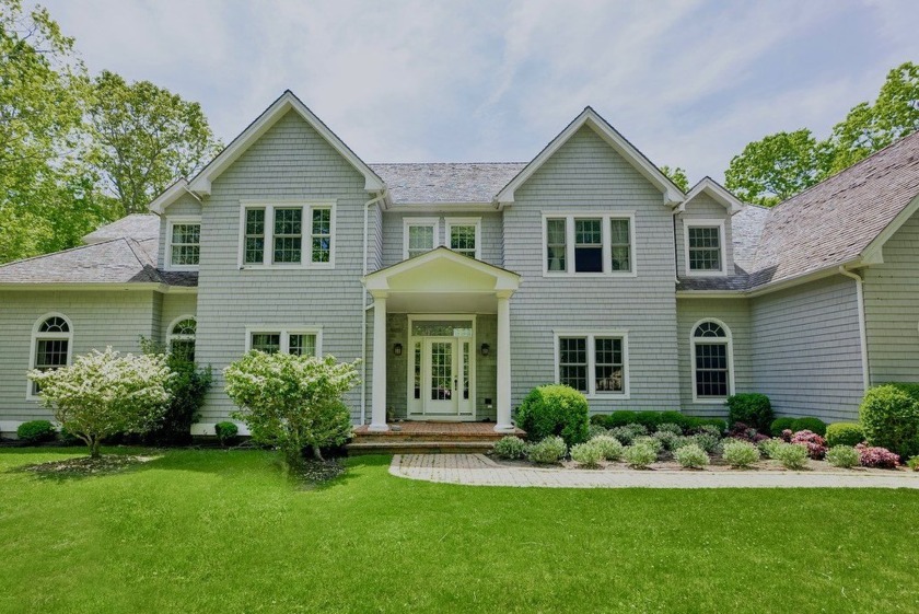 Nestled at the end of a quiet cul de sac street in the exclusive - Beach Home for sale in East Hampton, New York on Beachhouse.com