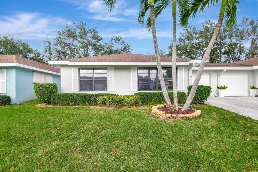 Discover this charming corner unit villa in Bent Tree East - Beach Condo for sale in Boynton Beach, Florida on Beachhouse.com