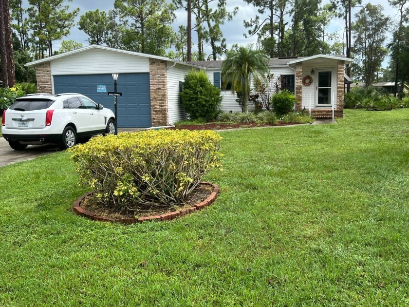 This lovely, manufactured home is in a 55+ community in Pine - Beach Home for sale in North Fort Myers, Florida on Beachhouse.com