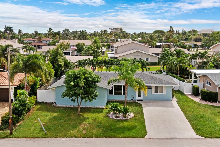 Located in The Cove, just 1.5 miles from the renowned Deerfield - Beach Home for sale in Deerfield Beach, Florida on Beachhouse.com