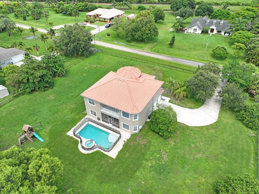 Impressive 2 Story CBS Home with 5 Bed/4.5 Bath/2 Car Garage - Beach Home for sale in Palm Beach Gardens, Florida on Beachhouse.com
