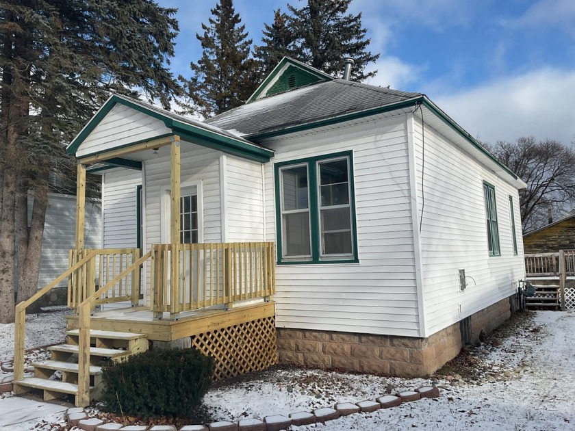 This charming three bedroom home in the heart of Cheboygan - Beach Home for sale in Cheboygan, Michigan on Beachhouse.com