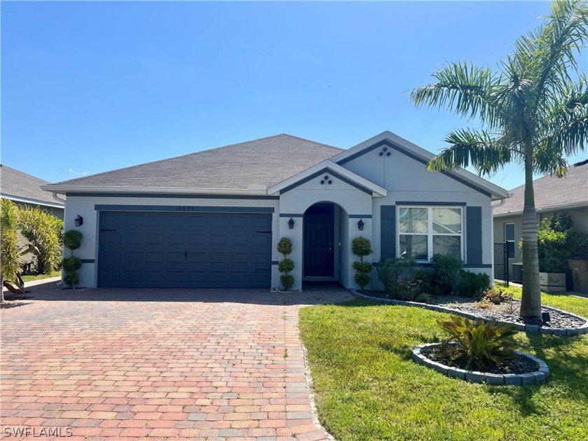 THREE BEDROOM TWO BATH POOL HOME BUILT IN 2019, located in an - Beach Home for sale in Lehigh Acres, Florida on Beachhouse.com