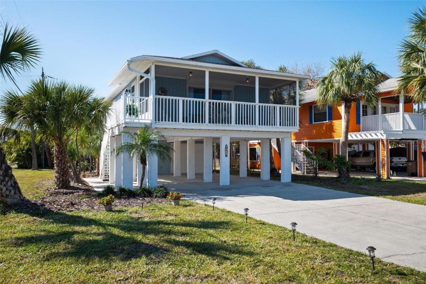 Welcome to where endless summers begin! Sandy toes and sunset - Beach Home for sale in Indian Rocks Beach, Florida on Beachhouse.com
