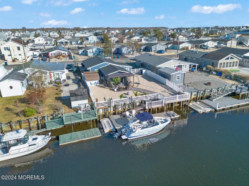 Discover your own slice of waterfront paradise with this - Beach Home for sale in Little Egg Harbor, New Jersey on Beachhouse.com