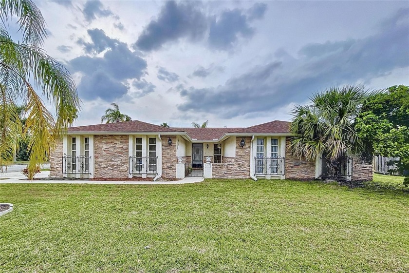 Welcome to your dream waterfront retreat! This immaculate - Beach Home for sale in Port Richey, Florida on Beachhouse.com