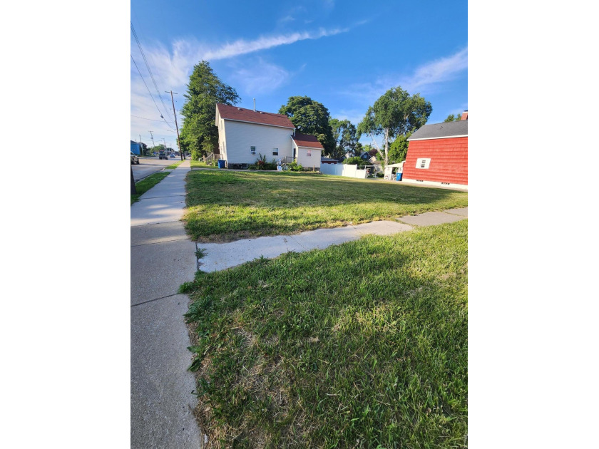 Corner building lot in Manistee. Just blocks from food and - Beach Lot for sale in Manistee, Michigan on Beachhouse.com