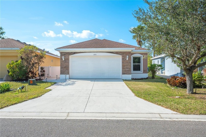 Step into this impeccably renovated three-bedroom, two-bathroom - Beach Home for sale in Palmetto, Florida on Beachhouse.com