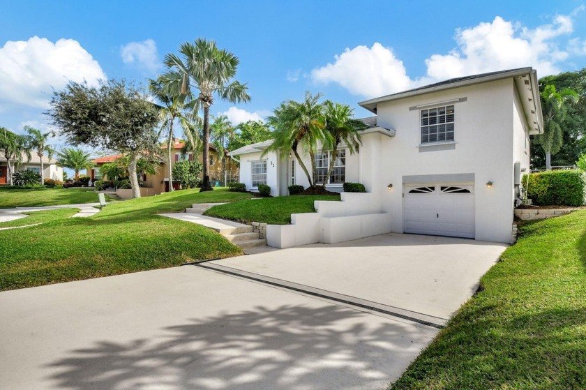 Rarely available split-level home in Cedar Ridge Estates - Beach Home for sale in Boynton Beach, Florida on Beachhouse.com