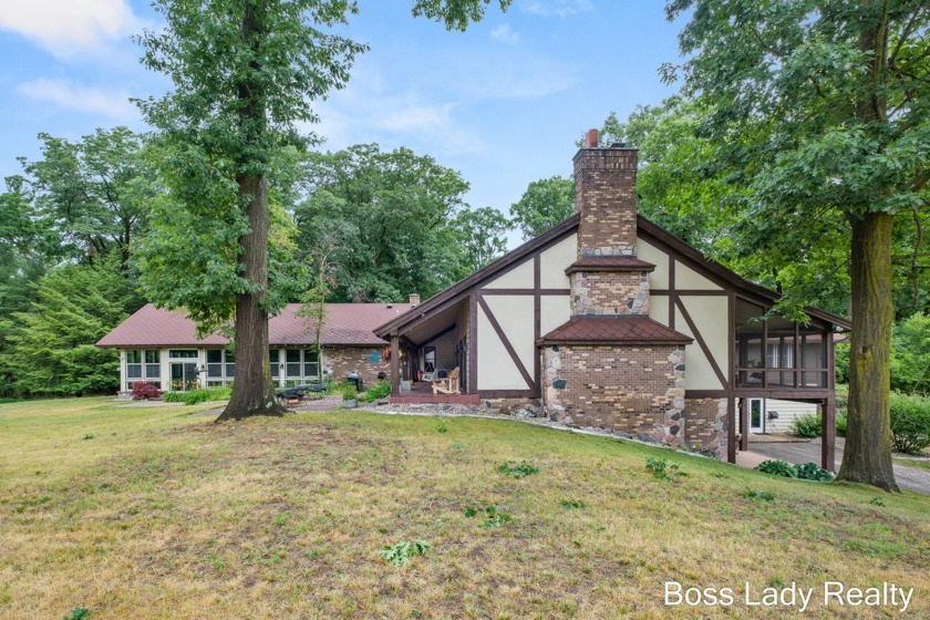 Welcome to your Wooded Estate, minutes from Lake Michigan, this - Beach Home for sale in West Olive, Michigan on Beachhouse.com