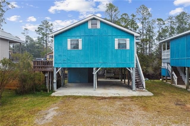 This beautiful cottage offers versatile living with a covered - Beach Home for sale in Bay Saint Louis, Mississippi on Beachhouse.com
