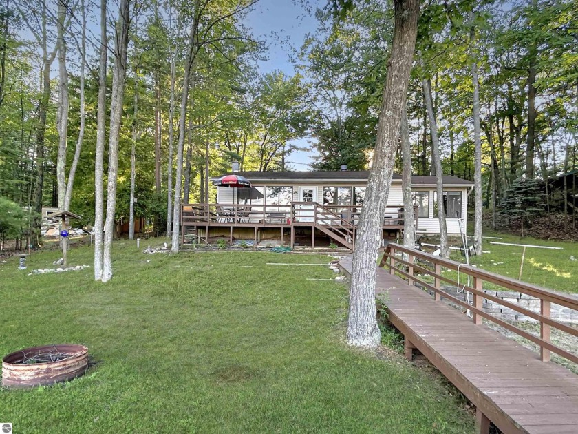Charming 2 BR, 2 bath home located on the picturesque Spider - Beach Home for sale in Traverse City, Michigan on Beachhouse.com