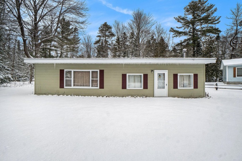 This cozy 3-bedroom, 1-bath home is perfect for year-round - Beach Home for sale in Cheboygan, Michigan on Beachhouse.com