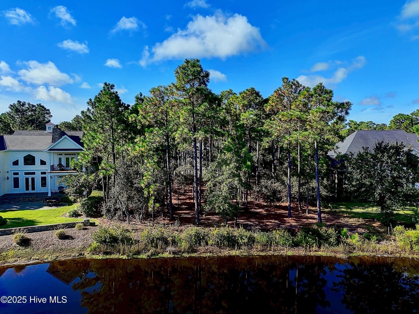 Discover a rare opportunity to own one of the few remaining pond - Beach Lot for sale in Southport, North Carolina on Beachhouse.com