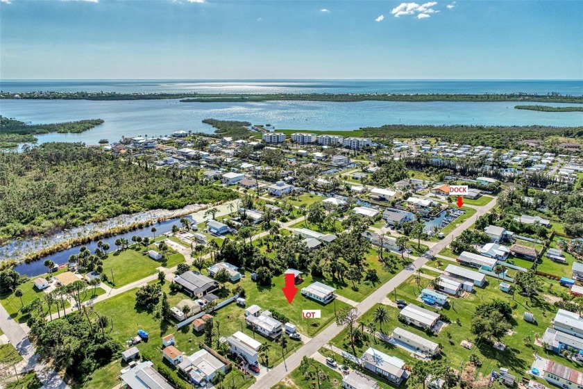 FOR SALE TWO PARCELS.  A LOT AT 8225 ROBERT ST AND A BOAT DOCK - Beach Lot for sale in Englewood, Florida on Beachhouse.com