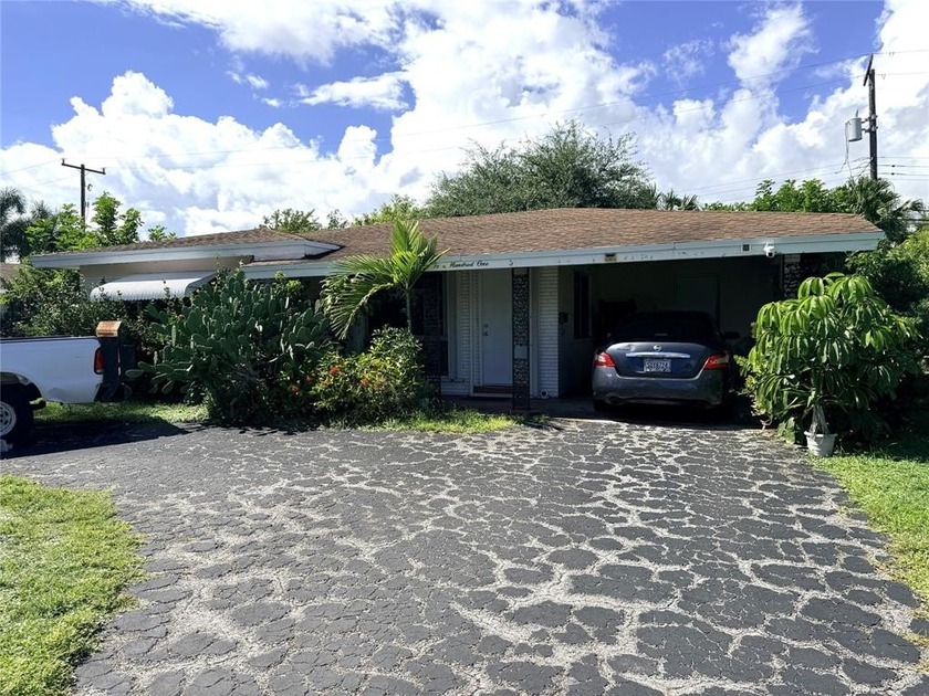 HANDYMAN SPECIAL! DISCOVER THE POTENTIAL IN THIS 2-BEDROOM - Beach Home for sale in Pompano Beach, Florida on Beachhouse.com