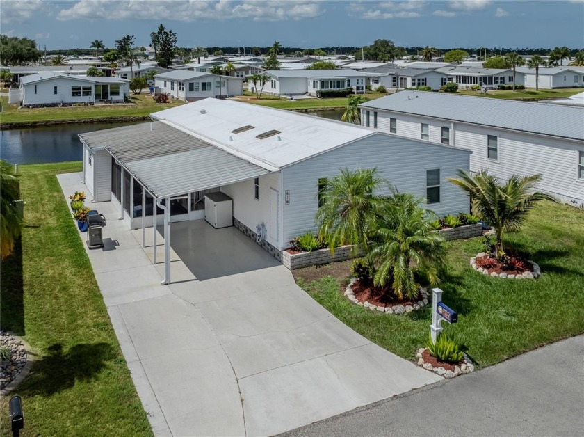Don't miss this rarely available newer home with expansive lake - Beach Home for sale in North Port, Florida on Beachhouse.com