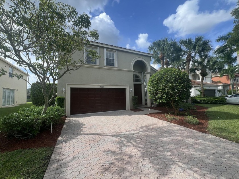 Spectacular lake front Olympia home that has been hardly lived - Beach Home for sale in Wellington, Florida on Beachhouse.com