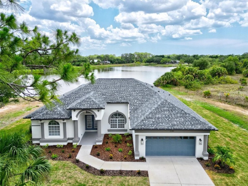 Stunning Custom Remodeled Home on 6.42 Acres with Gorgeous Lake - Beach Home for sale in Nokomis, Florida on Beachhouse.com