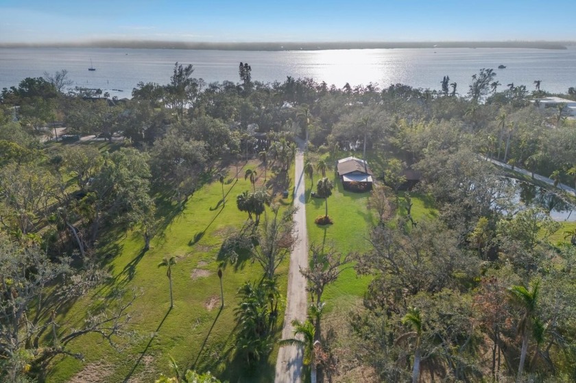 Simply Stunning Waterfront estate on Snead Island! This - Beach Home for sale in Palmetto, Florida on Beachhouse.com