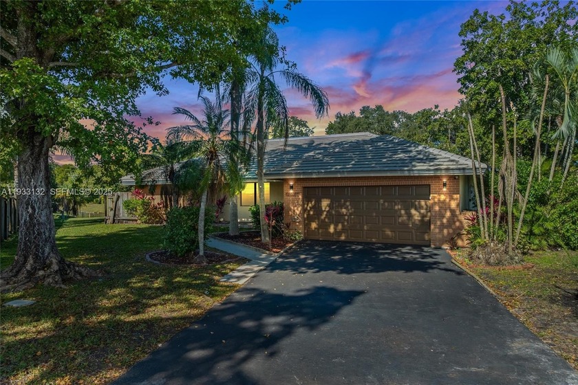 Welcome to this beautifully renovated pool home, ideally - Beach Home for sale in Coral Springs, Florida on Beachhouse.com
