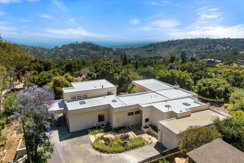 Framed by mature oaks and situated on an acre is this secluded - Beach Home for sale in Santa Barbara, California on Beachhouse.com