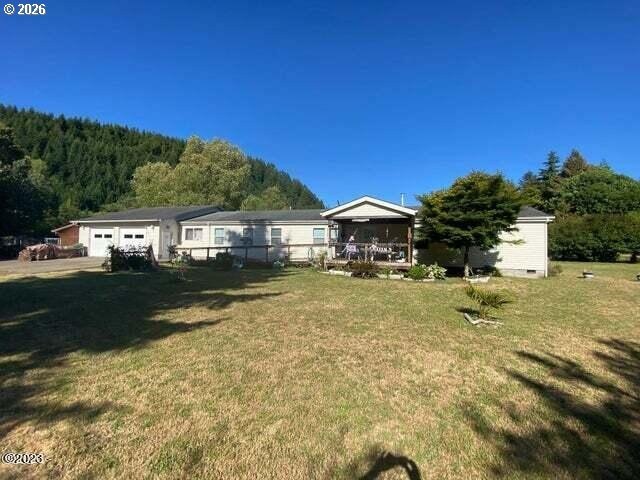 Level 2.04 acres with a 4 bedroom 2005 High End manufactured - Beach Home for sale in Otis, Oregon on Beachhouse.com
