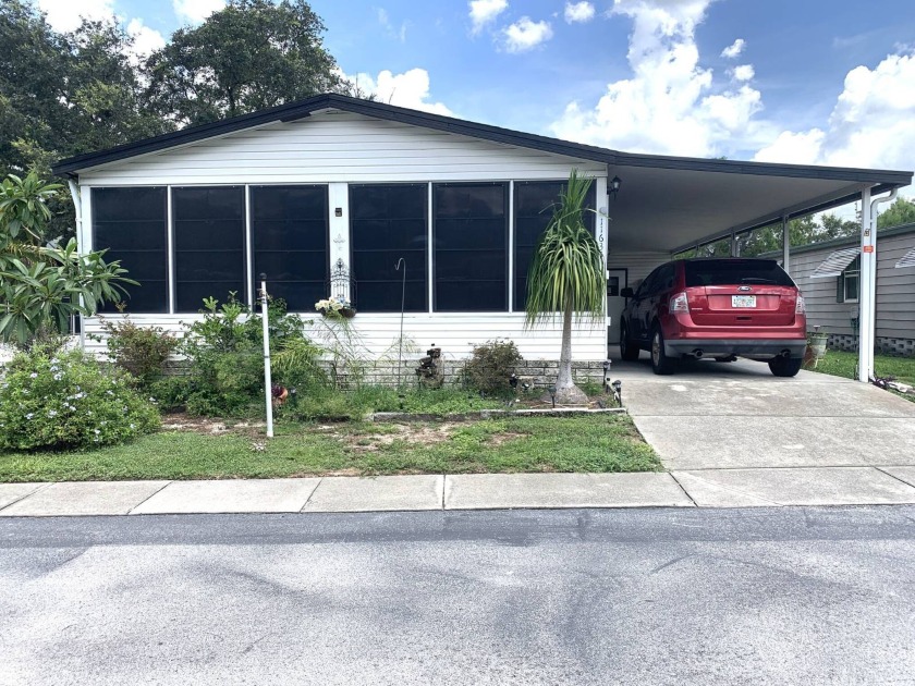 This is a LOVELY 2-Bedroom, 2-Bathroom FULLY FURNISHED home - Beach Home for sale in New Port Richey, Florida on Beachhouse.com