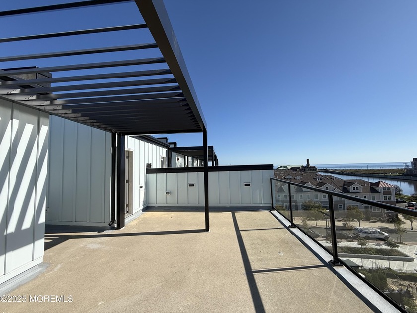 Spectacular water views on every level of this stunning Bolton - Beach Townhome/Townhouse for sale in Asbury Park, New Jersey on Beachhouse.com