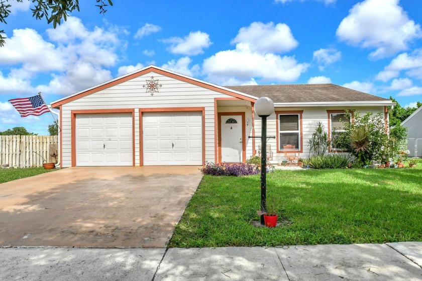 This spacious home, nestled in a sought-after neighborhood known - Beach Home for sale in Lake Worth, Florida on Beachhouse.com