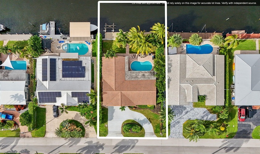 Updated deepwater home 80FT on protected canal--70 FT composite - Beach Home for sale in Pompano Beach, Florida on Beachhouse.com