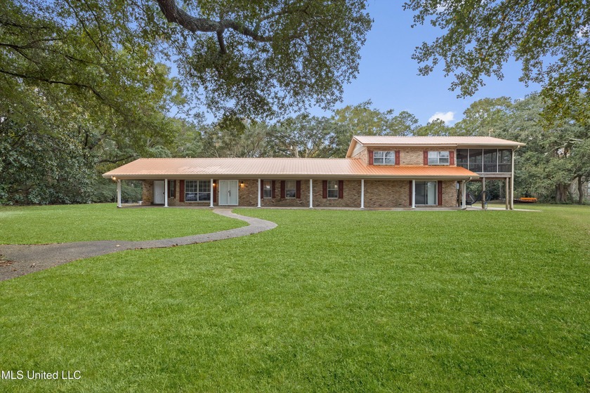 Rare gem in a fantastic location!! This beautiful waterfront - Beach Home for sale in Gautier, Mississippi on Beachhouse.com